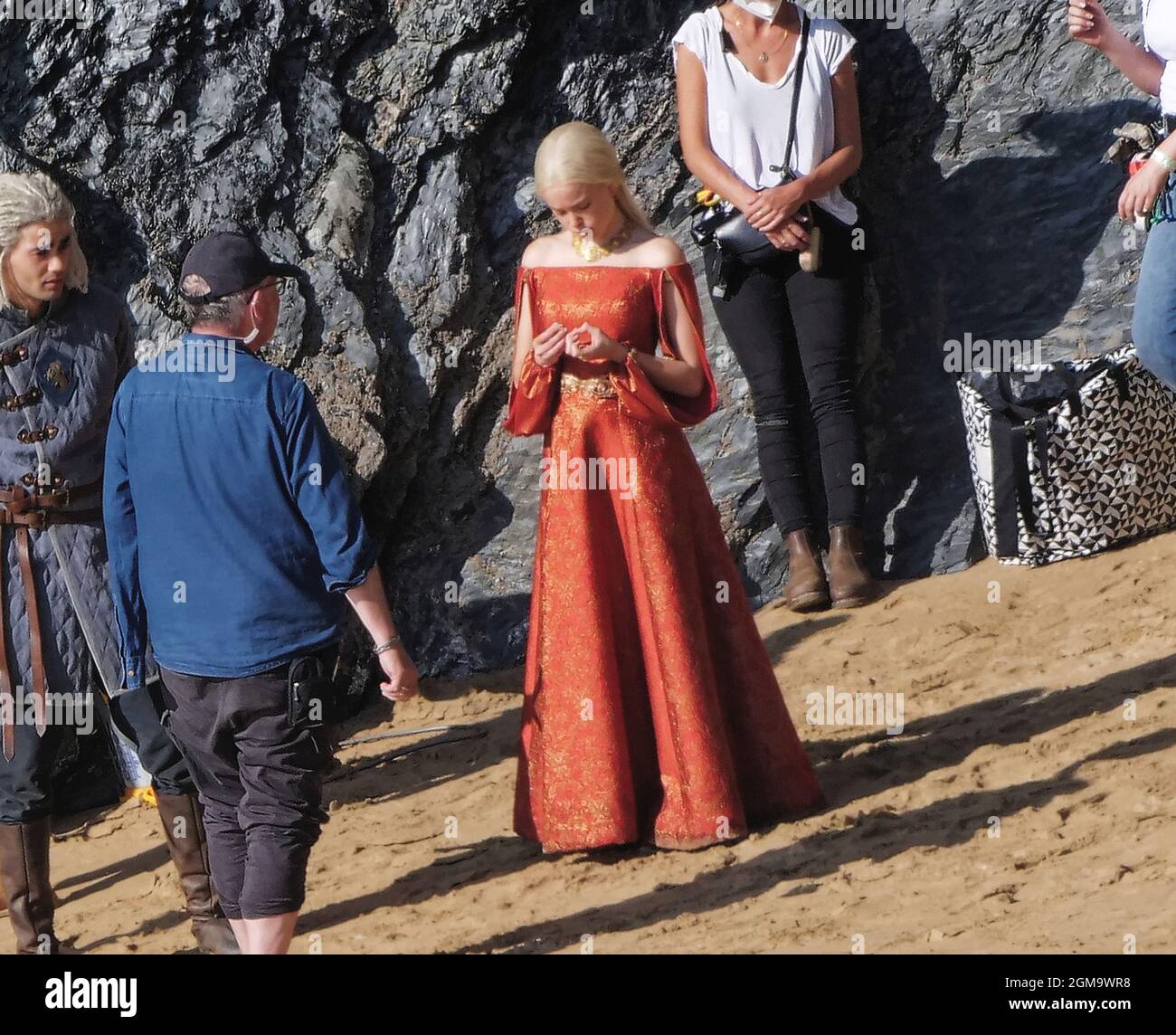 Cast and crew on Location film set at Holywell Bay Cornwall, set of House of Dragon exclusive Stock Photo