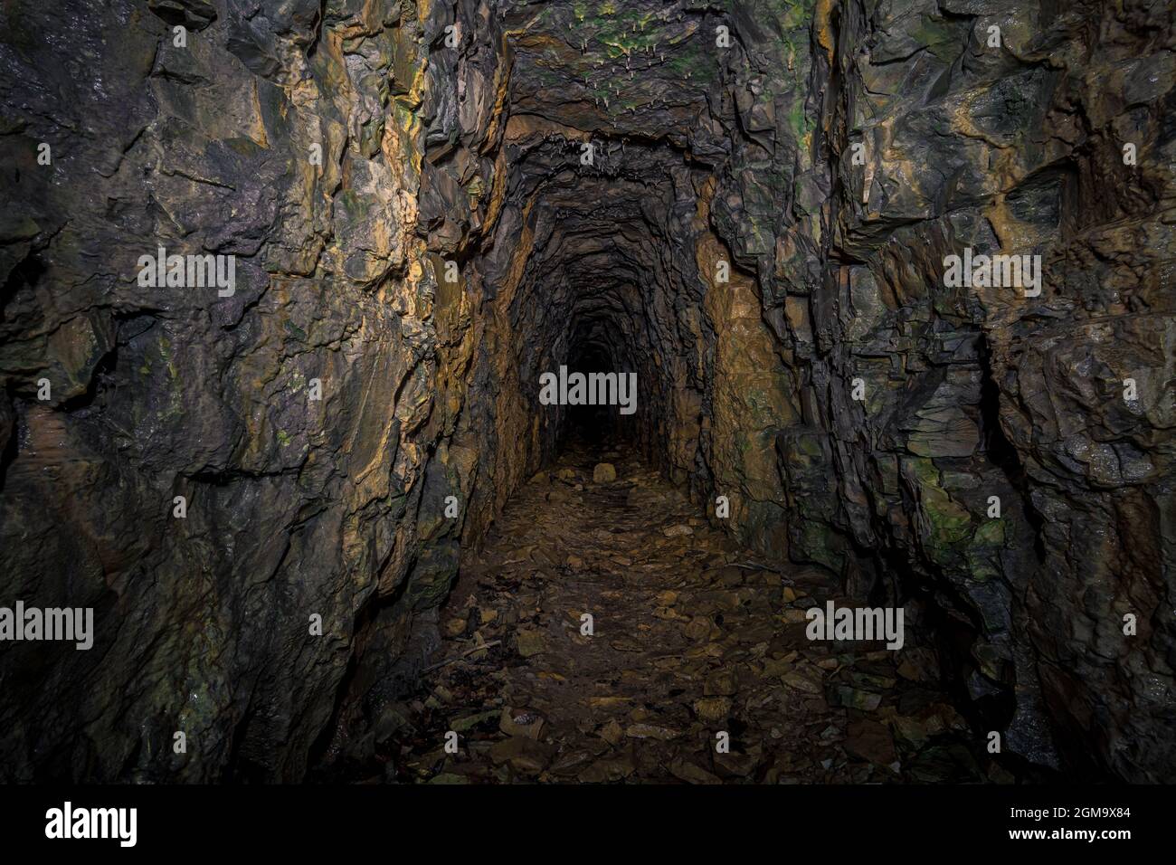 An old abandoned mining facility an ore mine tunnel system underground  Stock Photo - Alamy