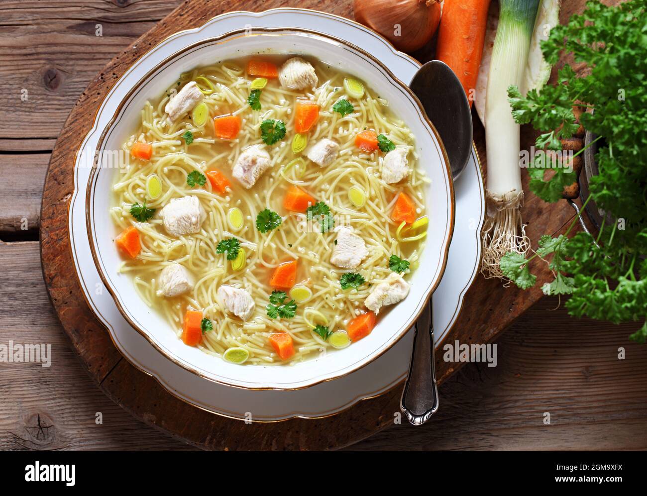 vegetable soup on wooden background Stock Photo