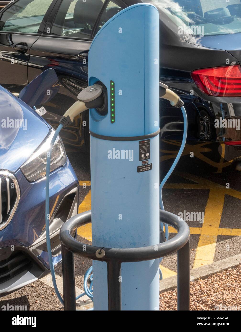 Electric car charging points outside BMW car dealers in Marsh Barton