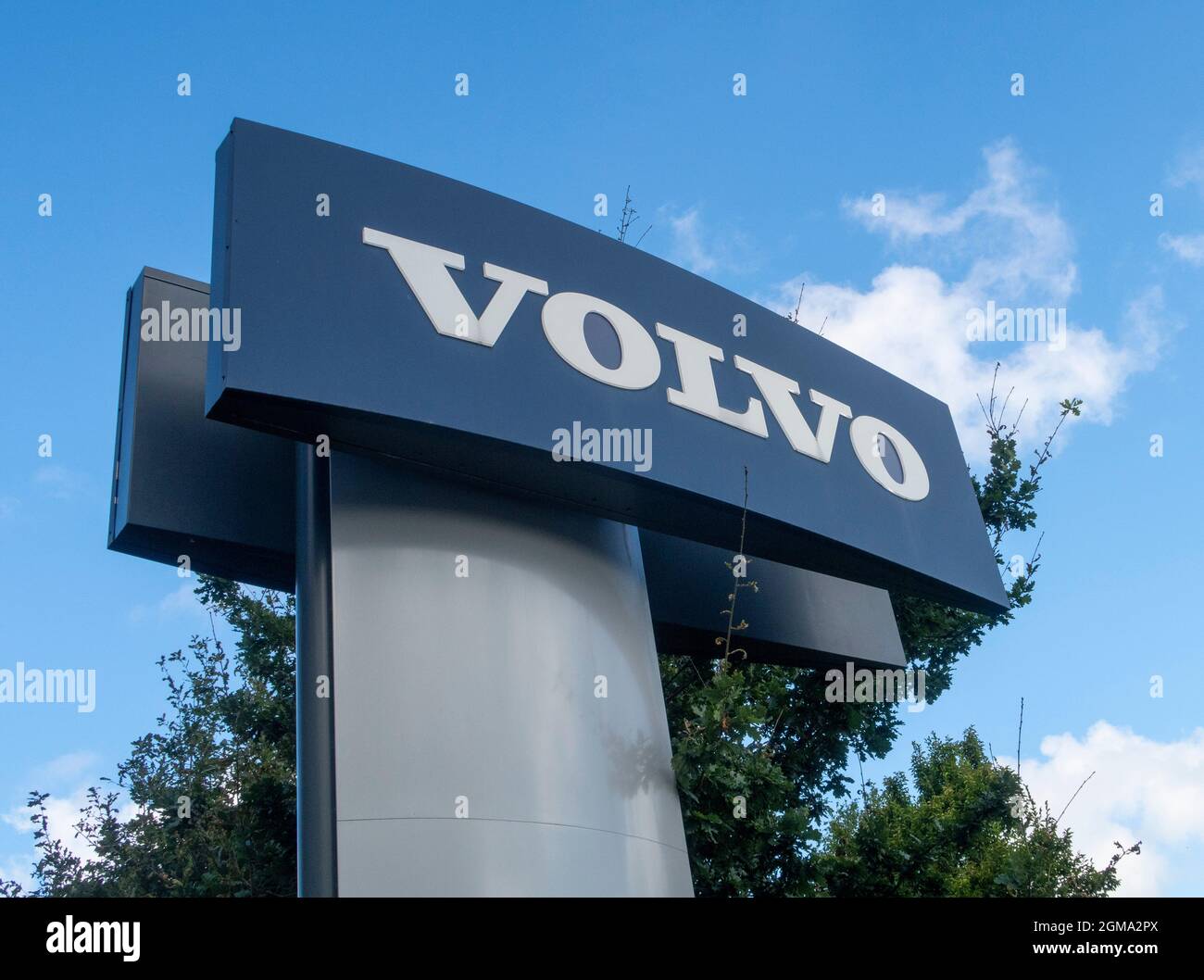 Volvo car logo and sign outside car dealer showroom, Exeter Stock Photo