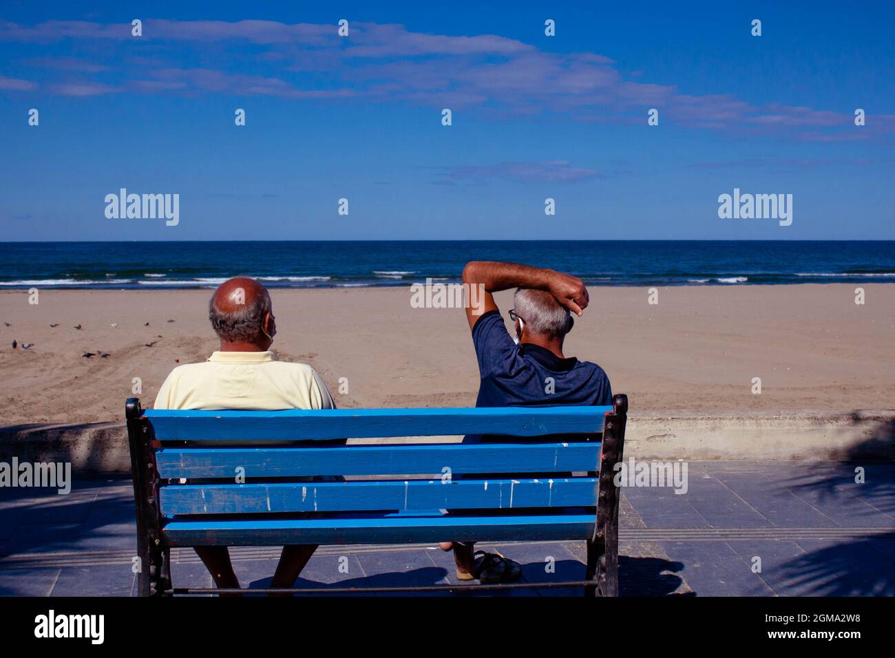 Elderly couple enjoying the sea view. Lovely homosexual relationship by the sea. hate free love. Stock Photo