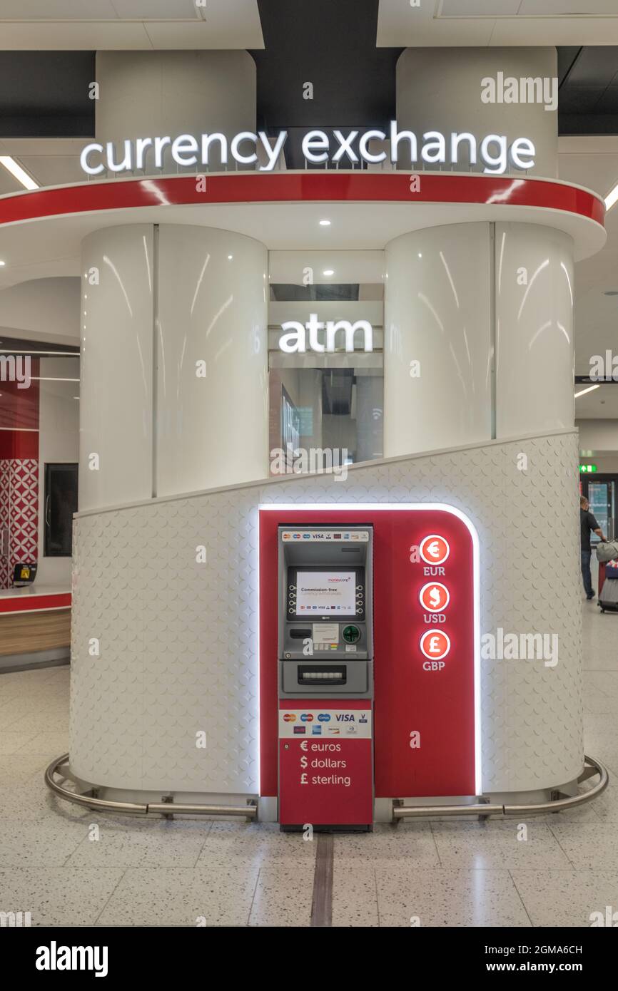 Currency Exchange machine at airport terminal, holiday money UK Stock