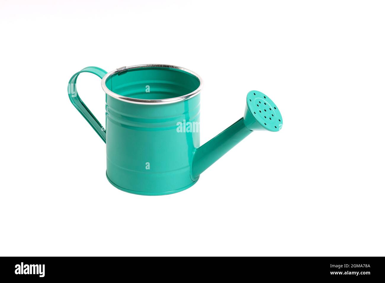 Green watering can on white background, isolate Stock Photo