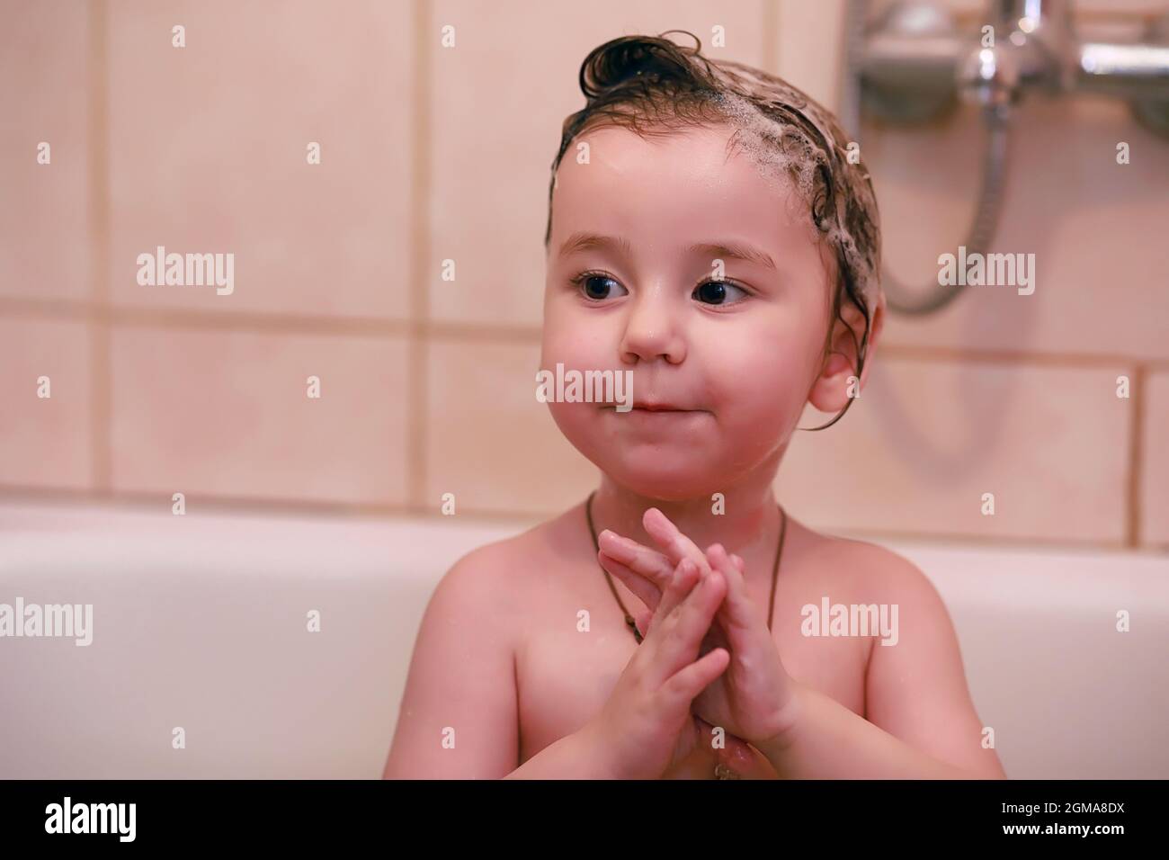 Young children take a bath. Children wash in bathroom. Brother and