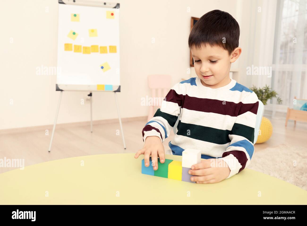 Little boy with autistic disorder at child psychologist's office Stock