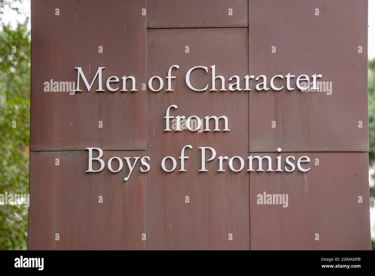Slogan at the entrance of the Crescent School in Bayview Avenue in Toronto, Canada. The slogan reads 'Men of Character from Boys of Promise' Stock Photo