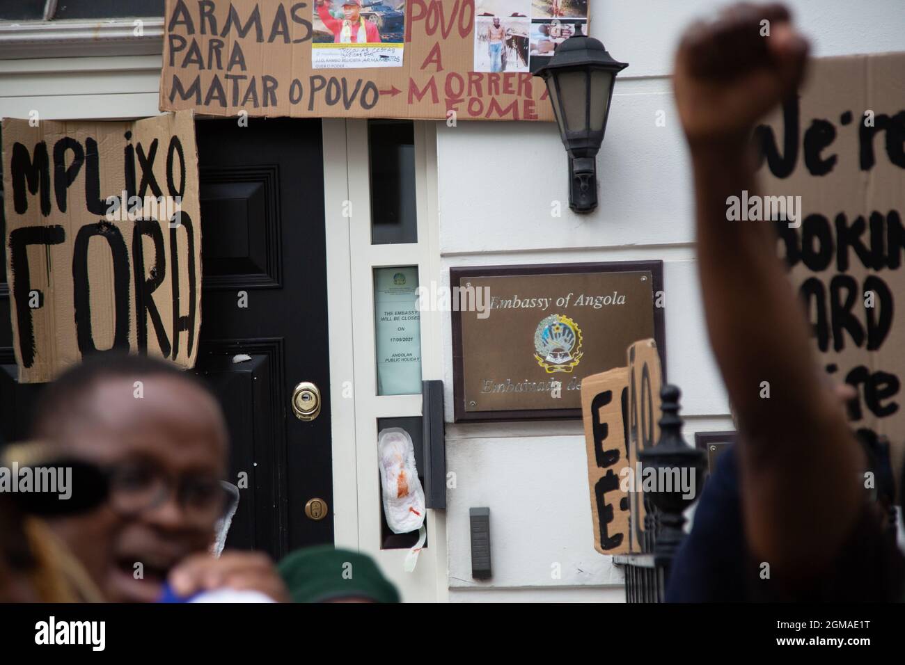 London, UK. 17th Sep, 2021. Placards are seen on the door of the Embassy of Angola during the demonstration.Activists held a protest against the rise of human rights Abuse, pedophilia and corruption in Angola. Credit: SOPA Images Limited/Alamy Live News Stock Photo