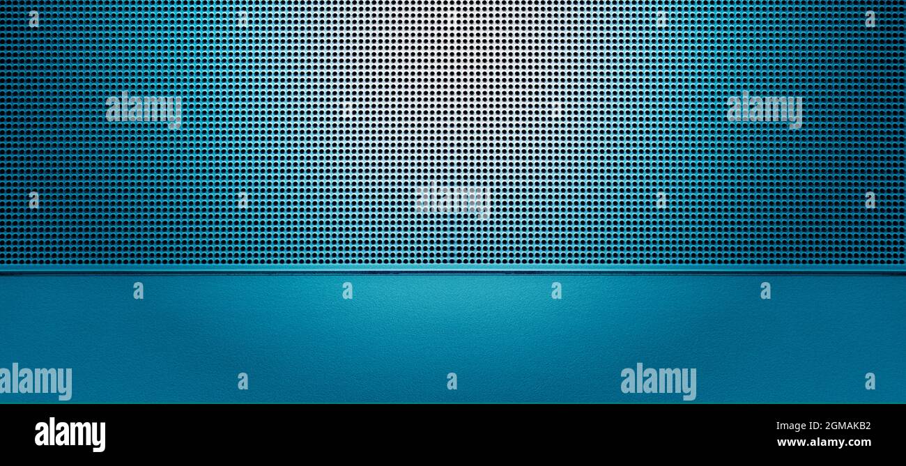 Spot lit perforated blue metal plate. Metal background close-up Stock Photo
