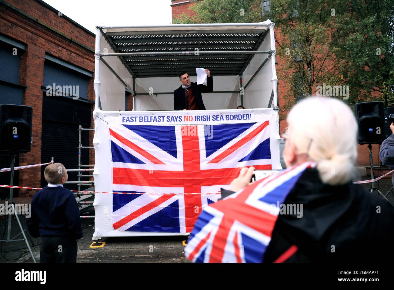Loyalist activist Moore Holmes speaks during a rally against the Northern Ireland Protocol in Newtownards Road, Belfast. Picture date: Friday September 17, 2021. Stock Photo