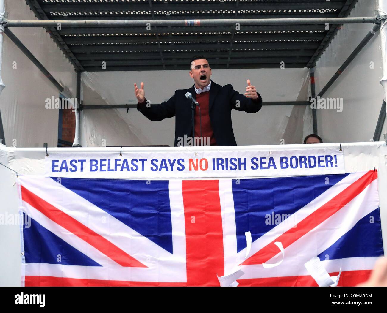 Loyalist activist Moore Holmes speaks during a rally against the Northern Ireland Protocol in Newtownards Road, Belfast. Picture date: Friday September 17, 2021. Stock Photo