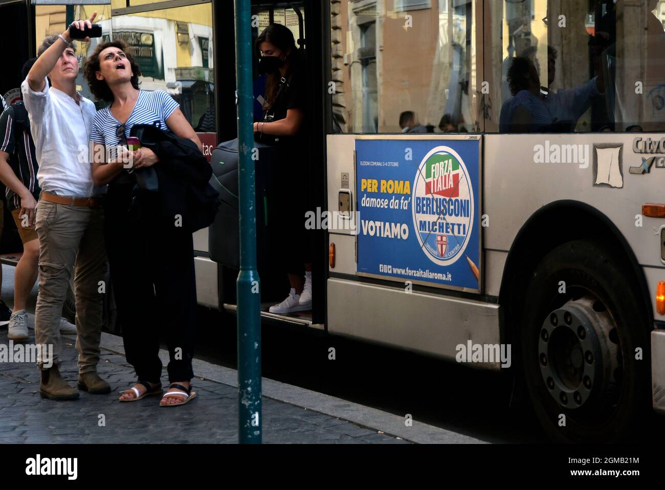 Rome, Italy. 17th Sep, 2021. The Forza Italia party election cartel, in support of Rome's center-right candidate for mayor Enrico Michetti, is displayed on a bus.The elections will be held on October 3rd and 4th, 2021, with all 22 candidates for mayors. The main candidates are four, Enrico Michetti, the center-right candidate, Roberto Gualtieri, the center-left candidate, Virginia Raggi, the outgoing mayor and candidate of the 5 Star Movement, and Carlo Calenda, former minister and leader of the Action party. (Photo by Vincenzo Nuzzolese/SOPA Images/Sipa USA) Credit: Sipa USA/Alamy Live News Stock Photo