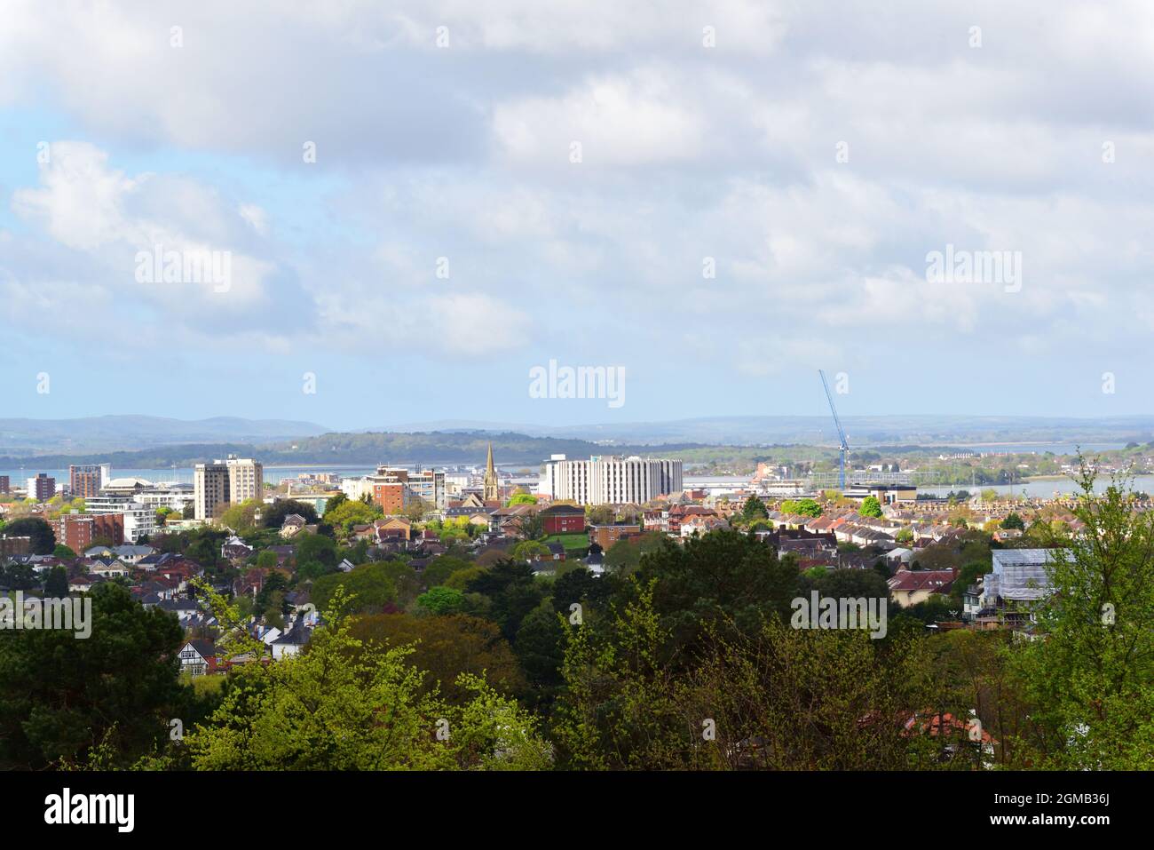 View over Poole town centre and Poole Harbour, with the Purbeck hills in the background. The Barclays building can be seen in the centre. Stock Photo