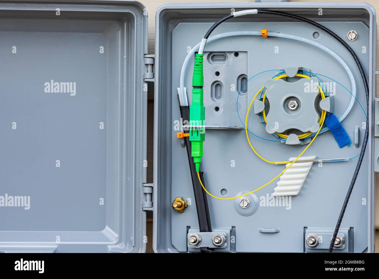 Fiber internet connection box on outside of house. Concept of fiber optic  internet installation, broadband access and internet speed Stock Photo -  Alamy