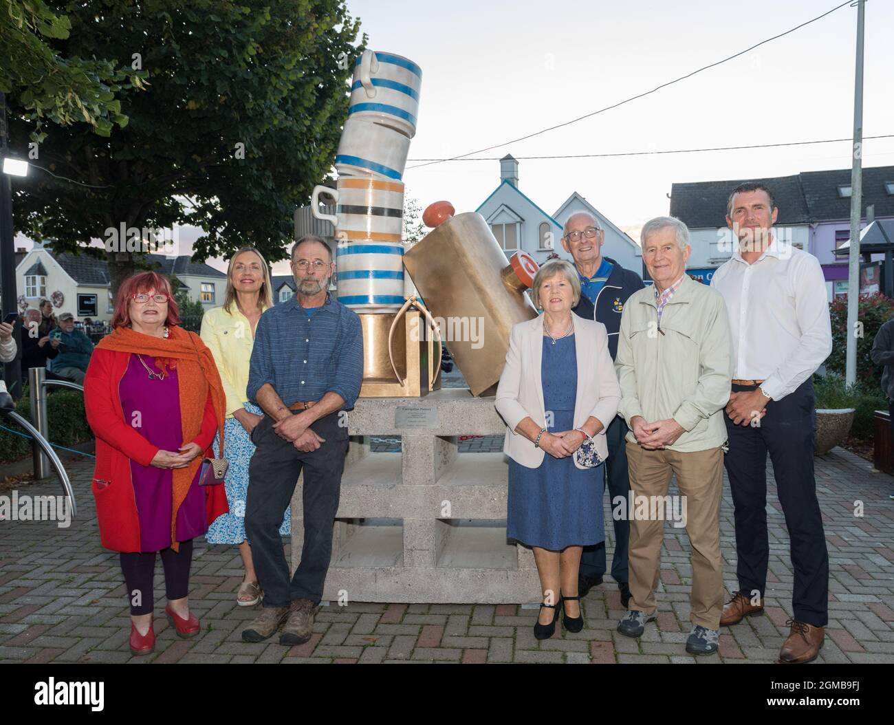 Carrigaline, Cork, Ireland. 17th September, 2021.Members of the Tidy Towns who unveiled at staute on Culture Night in honour of the now closed Carrigaline Pottery at the town centre in Carrigaline, Co. Cork. Picture shows LtoR; Maura Allen, Clare O' Mullane, Mick Wilkins (Sculptor), Betty O' Riordan, Thos Maye, Pat Farrell and Liam O'Connor.  - Picture; David Creedon / / Alamy Live News Stock Photo