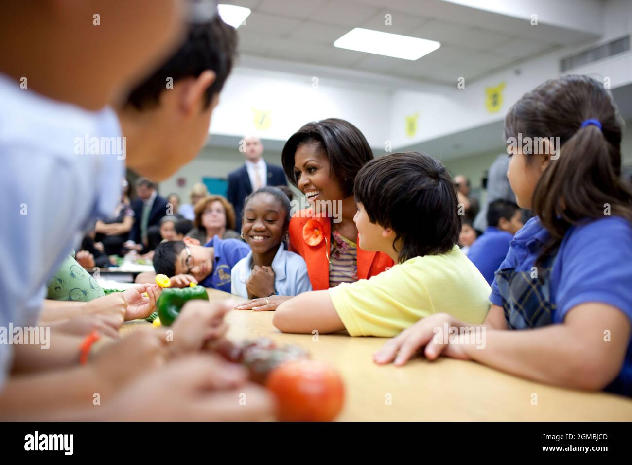 First Lady Michelle Obama joins students for a 'Let's Move!' Salad Bars to Schools launch event at Riverside Elementary School in Miami, Fla., Nov. 22, 2010. (Official White House Photo by Chuck Kennedy) This official White House photograph is being made available only for publication by news organizations and/or for personal use printing by the subject(s) of the photograph. The photograph may not be manipulated in any way and may not be used in commercial or political materials, advertisements, emails, products, promotions that in any way suggests approval or endorsement of the President, the Stock Photo