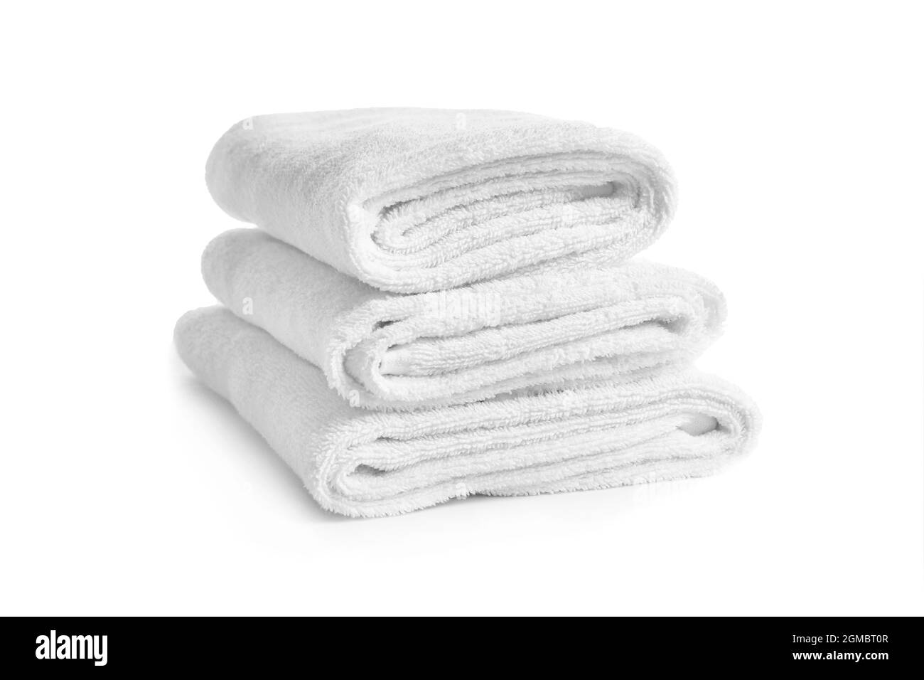 Folded clean terry towels on white background Stock Photo Alamy