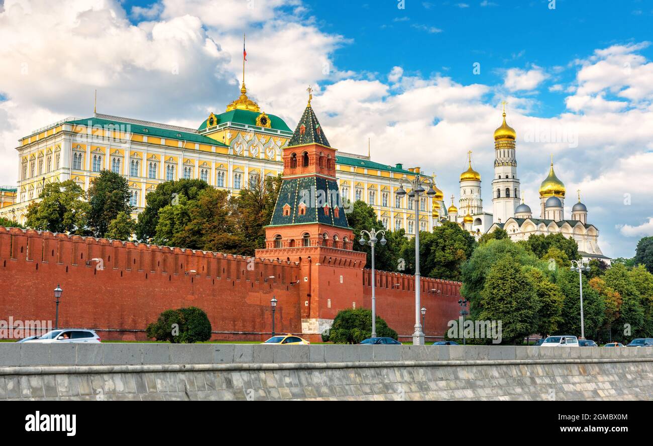 Moscow Kremlin in summer, Russia. It is top tourist attraction of Moscow. Scenery of Kremlin Embankment and wall at Moskva River. Urban landscape of M Stock Photo