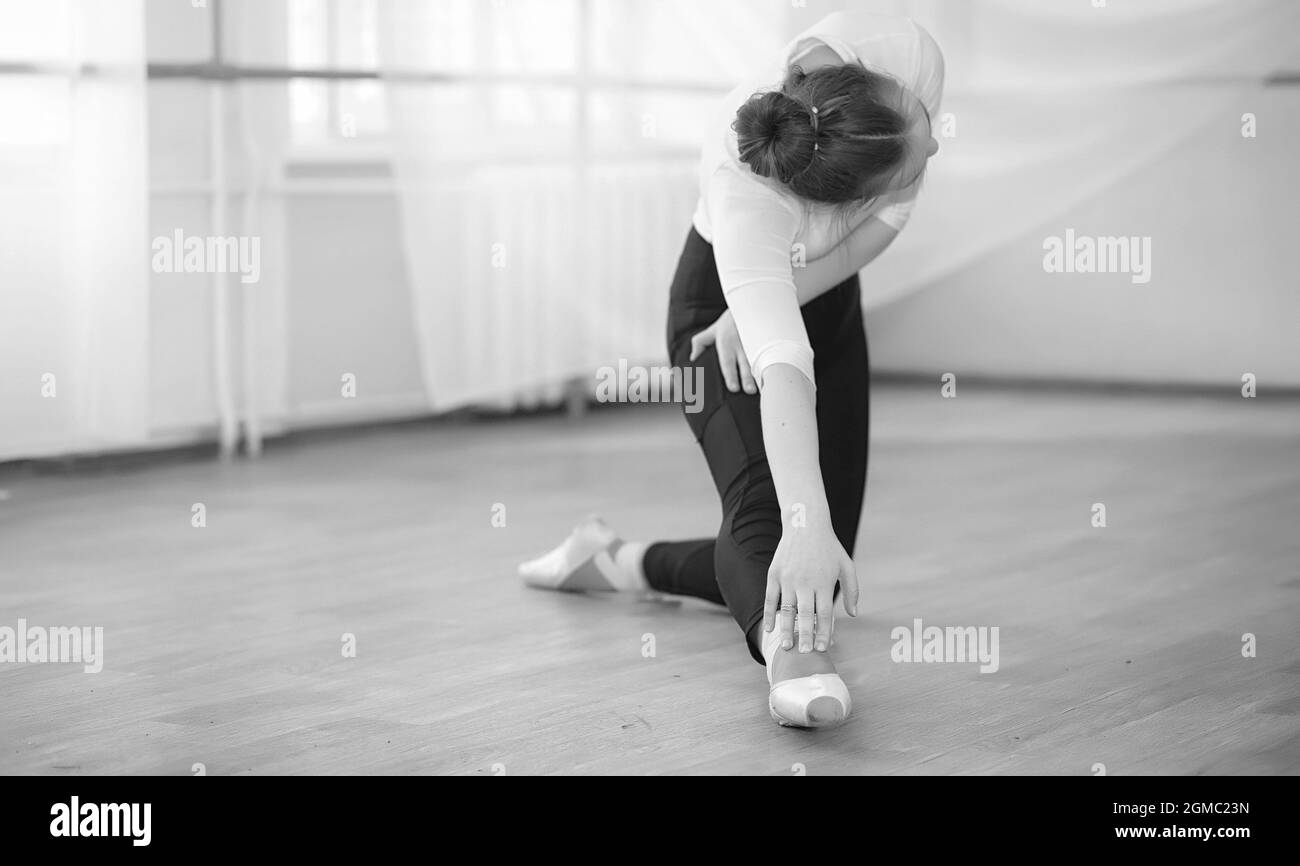 Ballerina Warming Up before Rehearsal. Girl Dressed in Tights. Stock Photo  - Image of ballet, black: 62524766