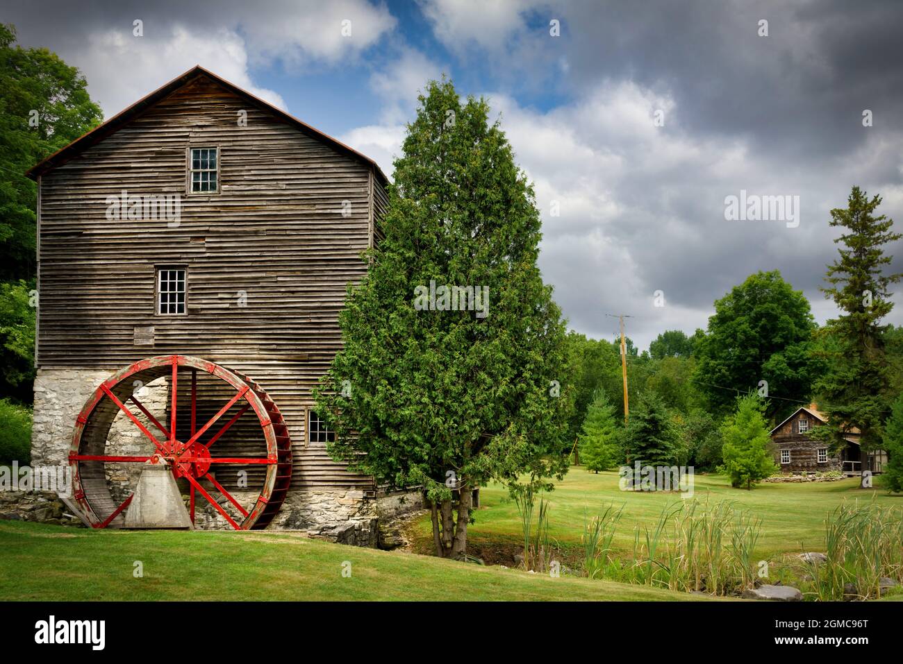 An old grist mill sits in the countryside of Manitowoc County in Wisconsin. Stock Photo