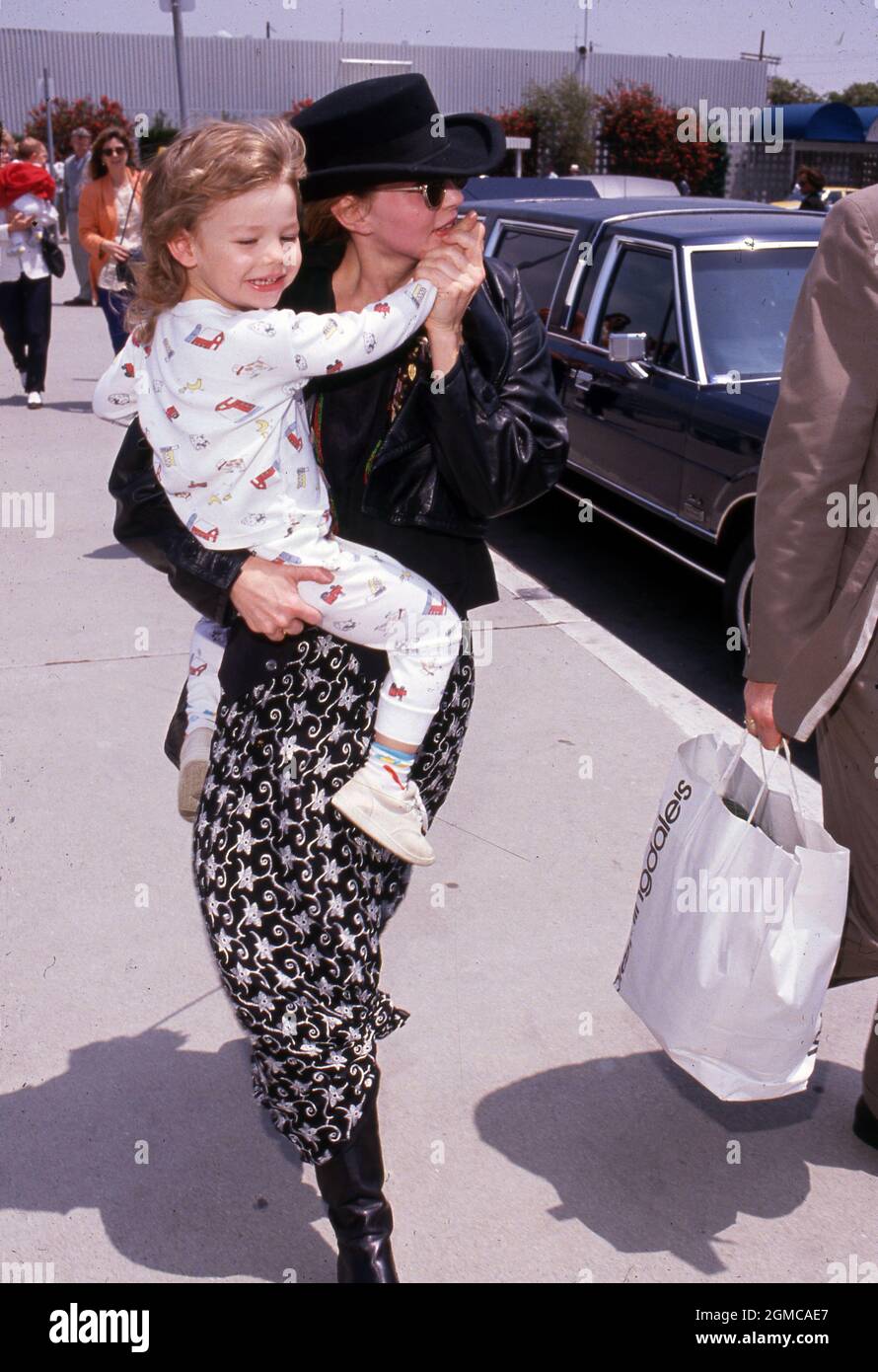LOS ANGELES - MAY 13: Actress Priscilla Presley and son Navarone Garibaldi  on May 13, 1990 arrive at the Los Angeles International Airport in Los  Angeles, California. Credit: Ralph Dominguez/MediaPunch Stock Photo - Alamy