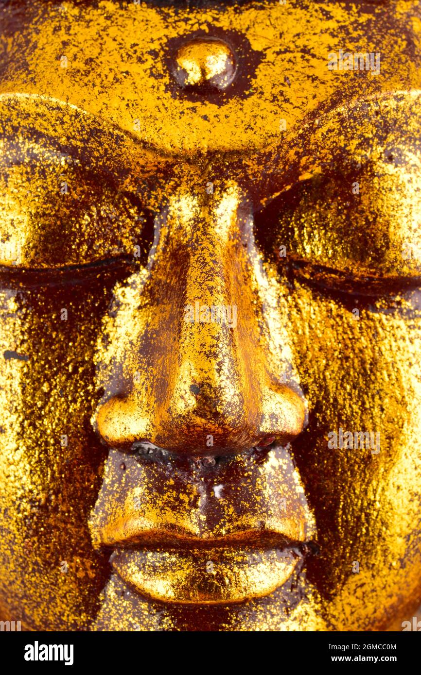 Golden Buddha Face Isolated on White Background Stock Photo