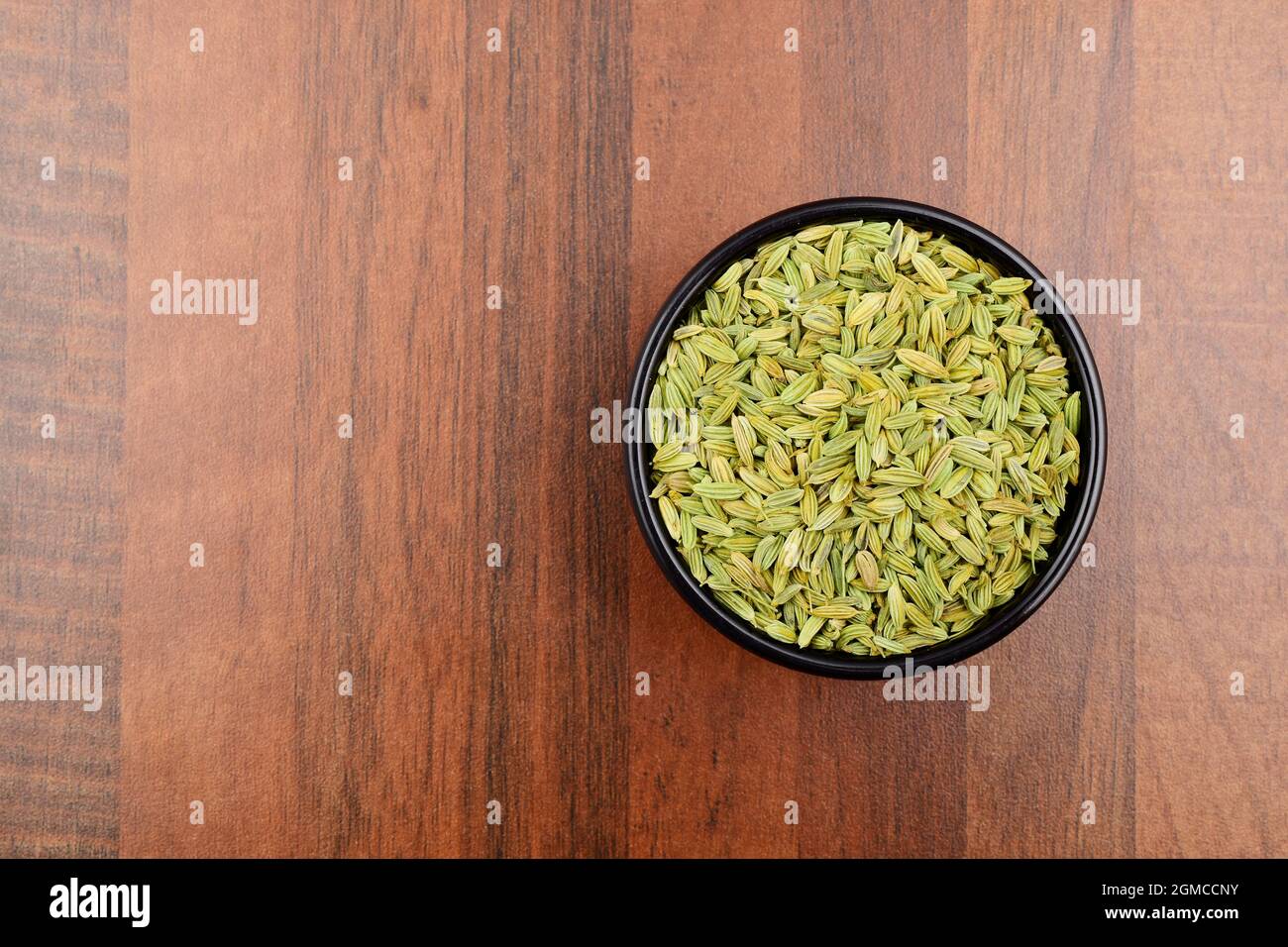 Top view of fennel seeds in bowl Stock Photo