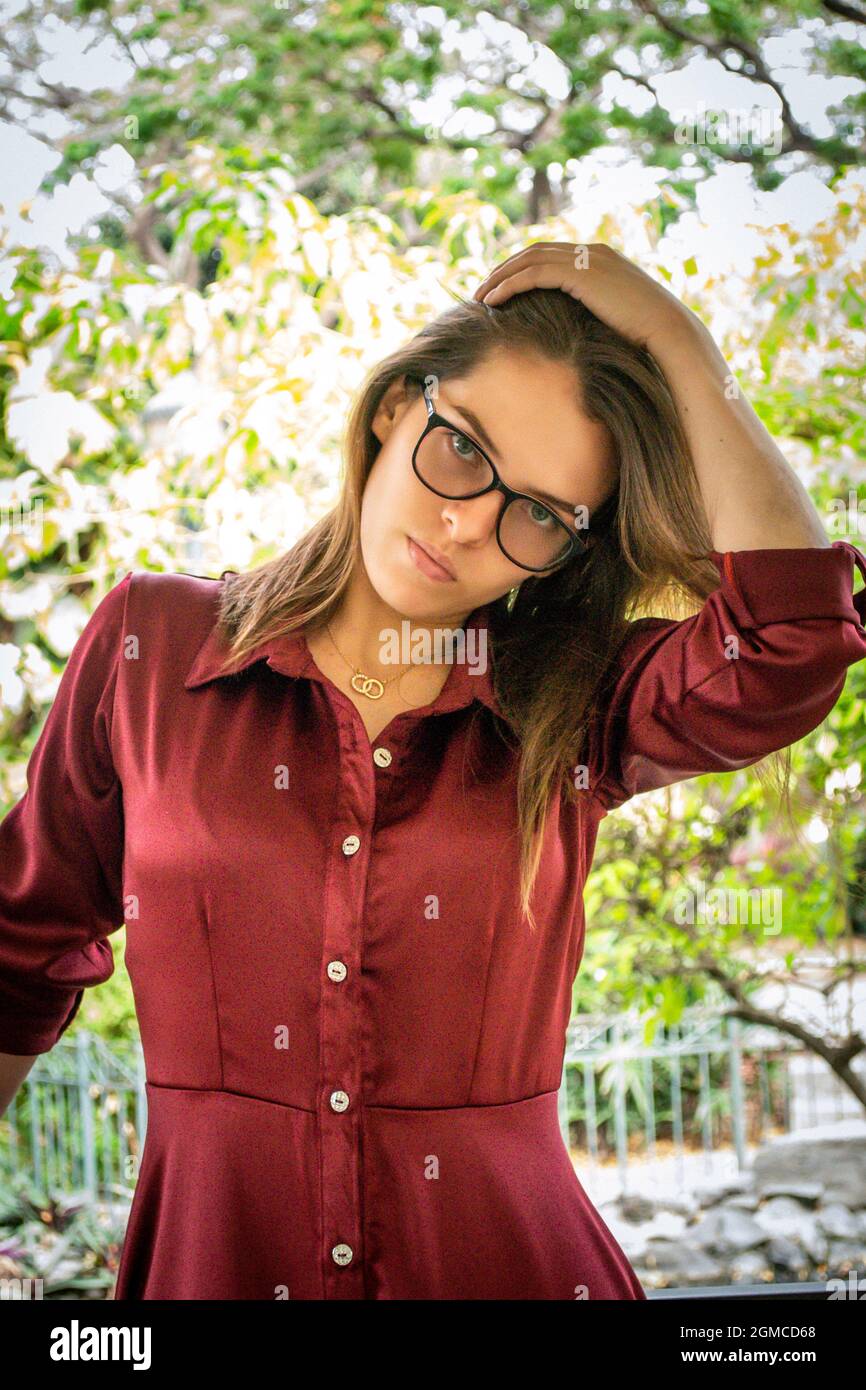 Woman wearing red glasses black hi-res stock photography and images - Alamy