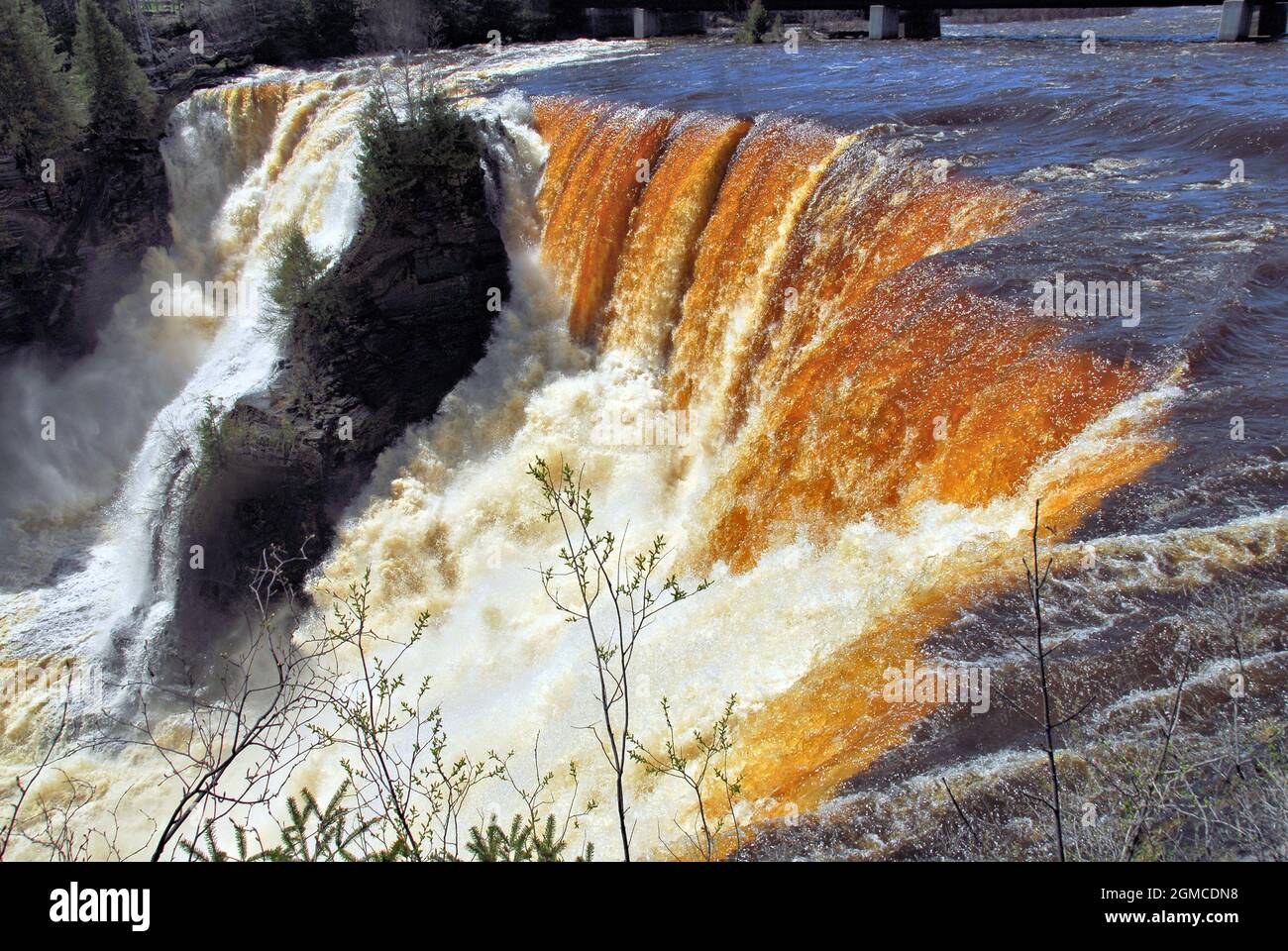 The 40 meter Kakabeka falls has a lot of water rushing over it in Oct. 2011, and is on the main highway into Thunder Bay. Stock Photo