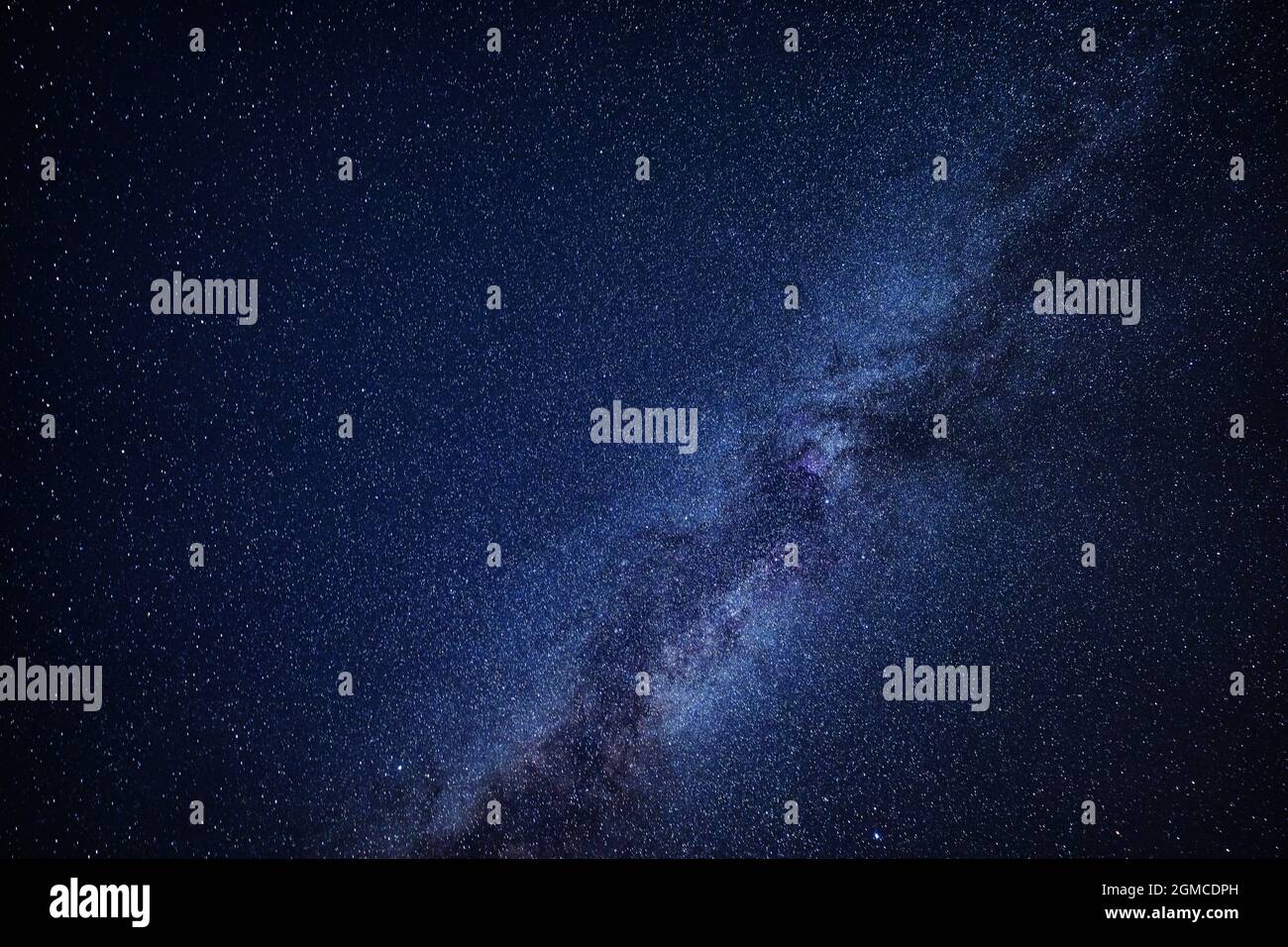 Milky Way Galaxy Against A Starry Dark Sky Stock Photo - Alamy