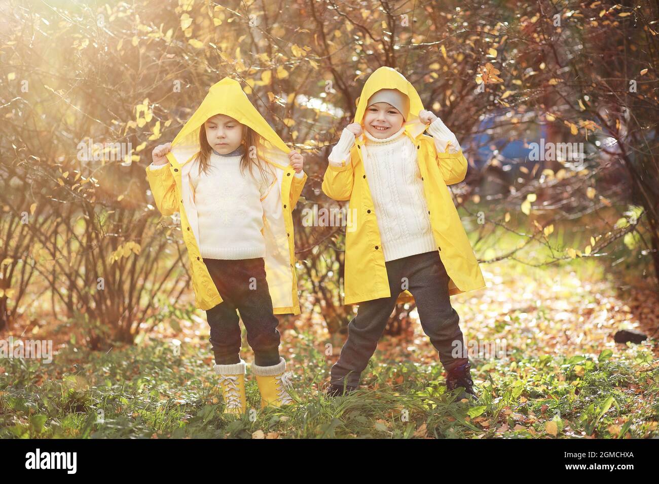 Children walk in the autumn park in the fall Stock Photo Alamy