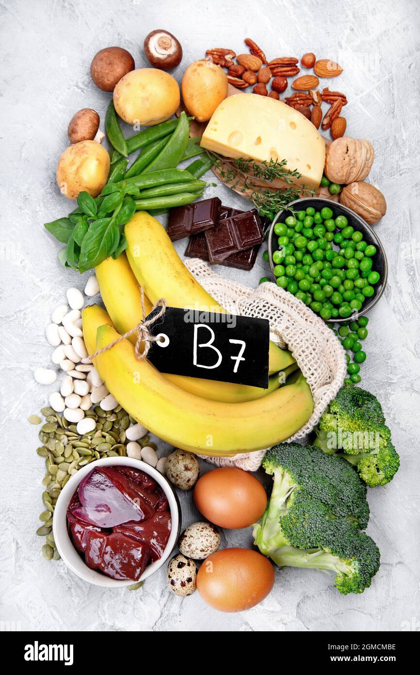 Food high in vitamin B7 on dark background. Healthy diet concept. Top