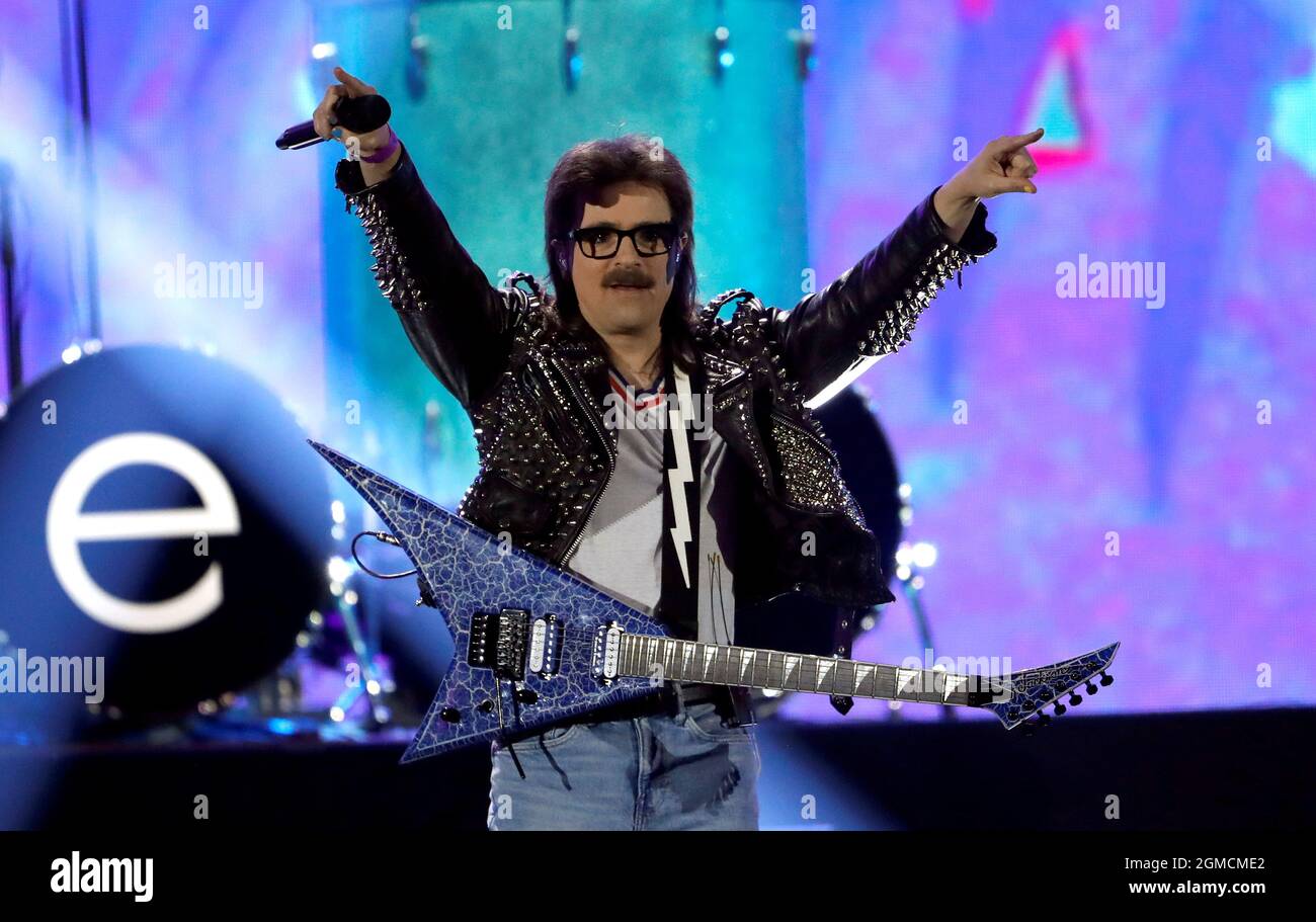 Weezer lead singer Rivers Cuomo performs during the first day of the