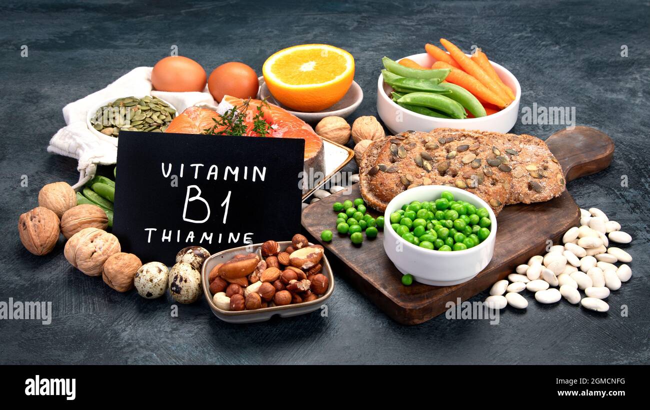 Food high in vitamin B1 on dark background. Healthy diet concept Stock
