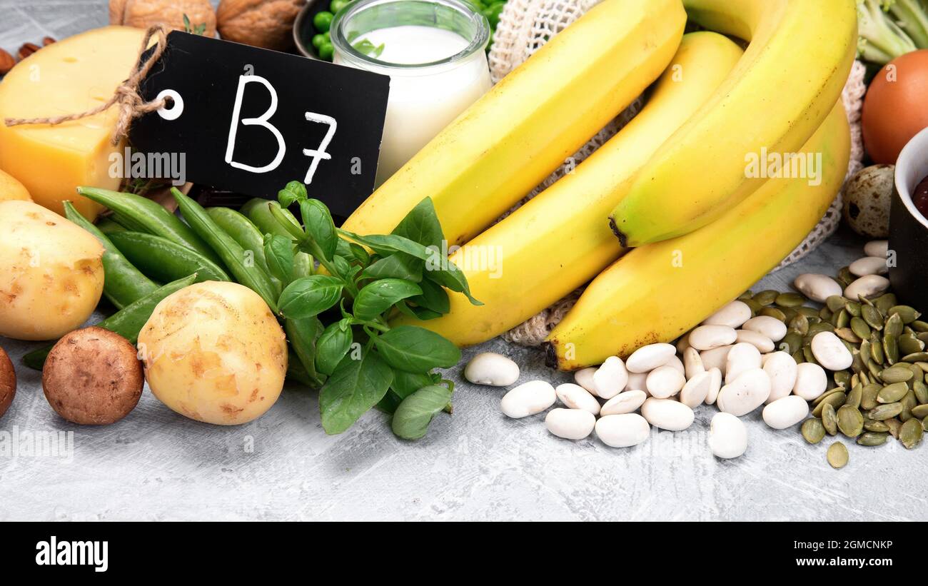 Food high in vitamin B7 on dark background. Healthy diet concept. Copy