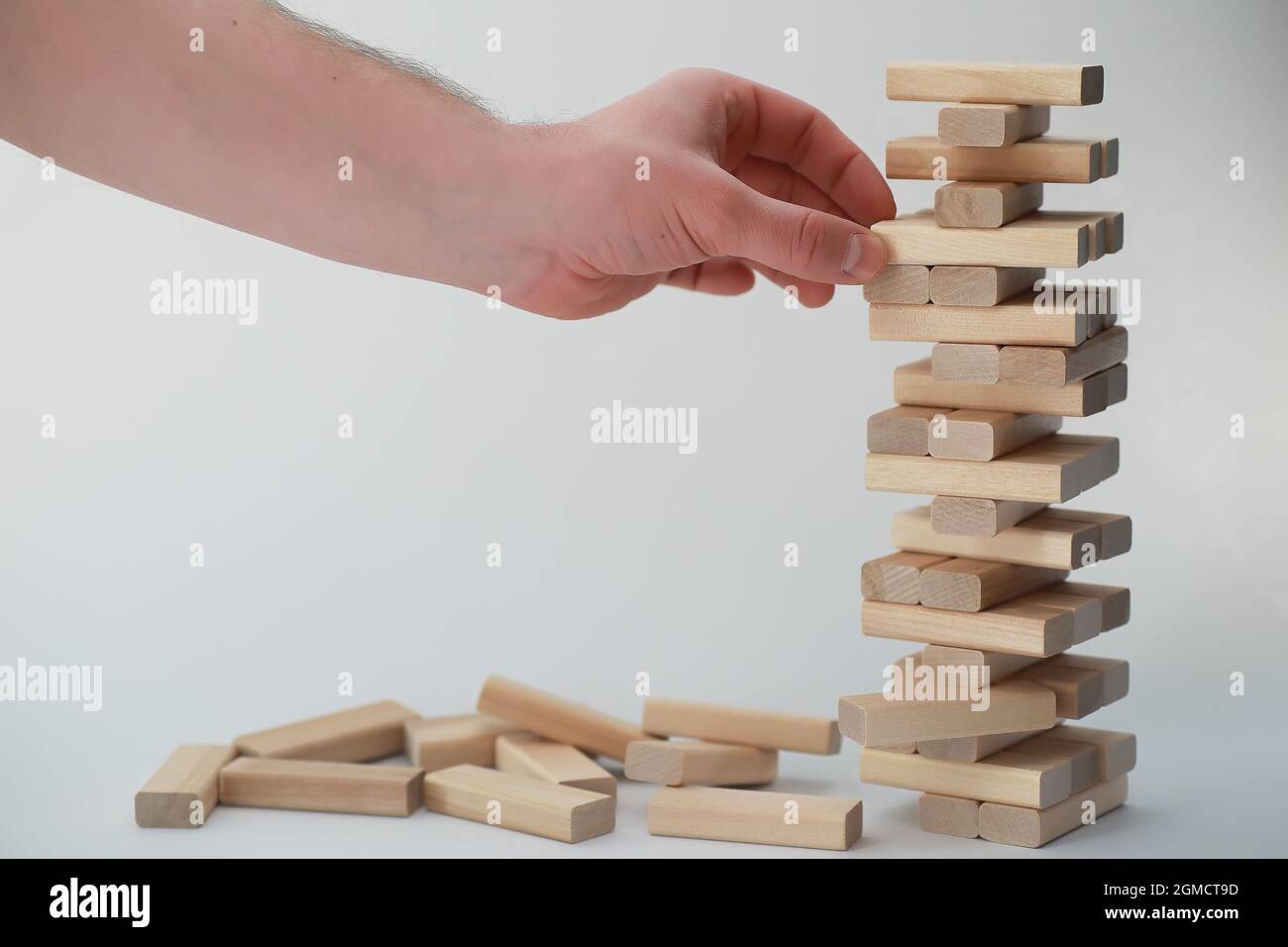 Board game jenga tower of light wood sticks Stock Photo - Alamy