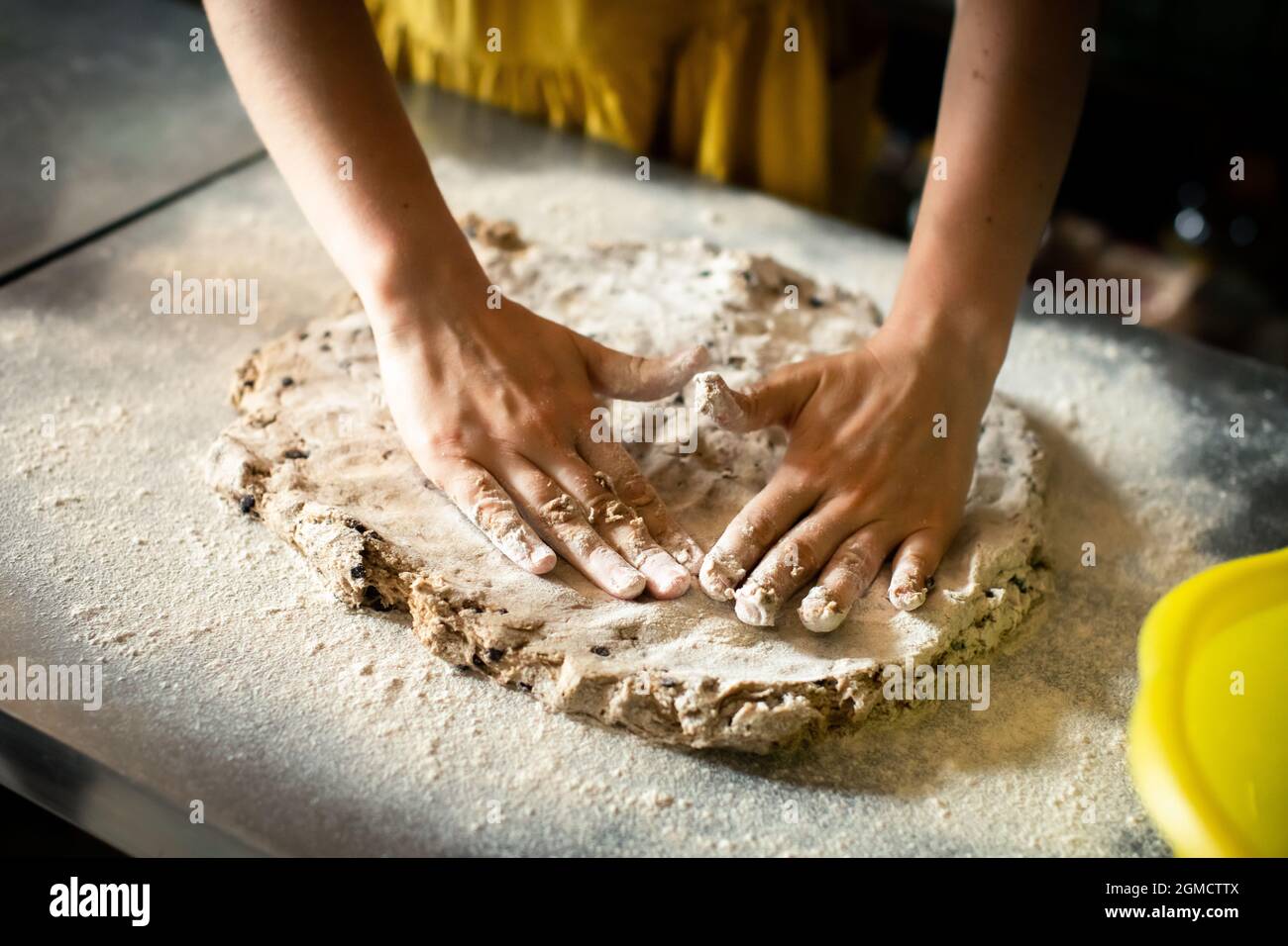 Molding rye sticks with chocolate and hazelnuts by a woman Stock Photo ...