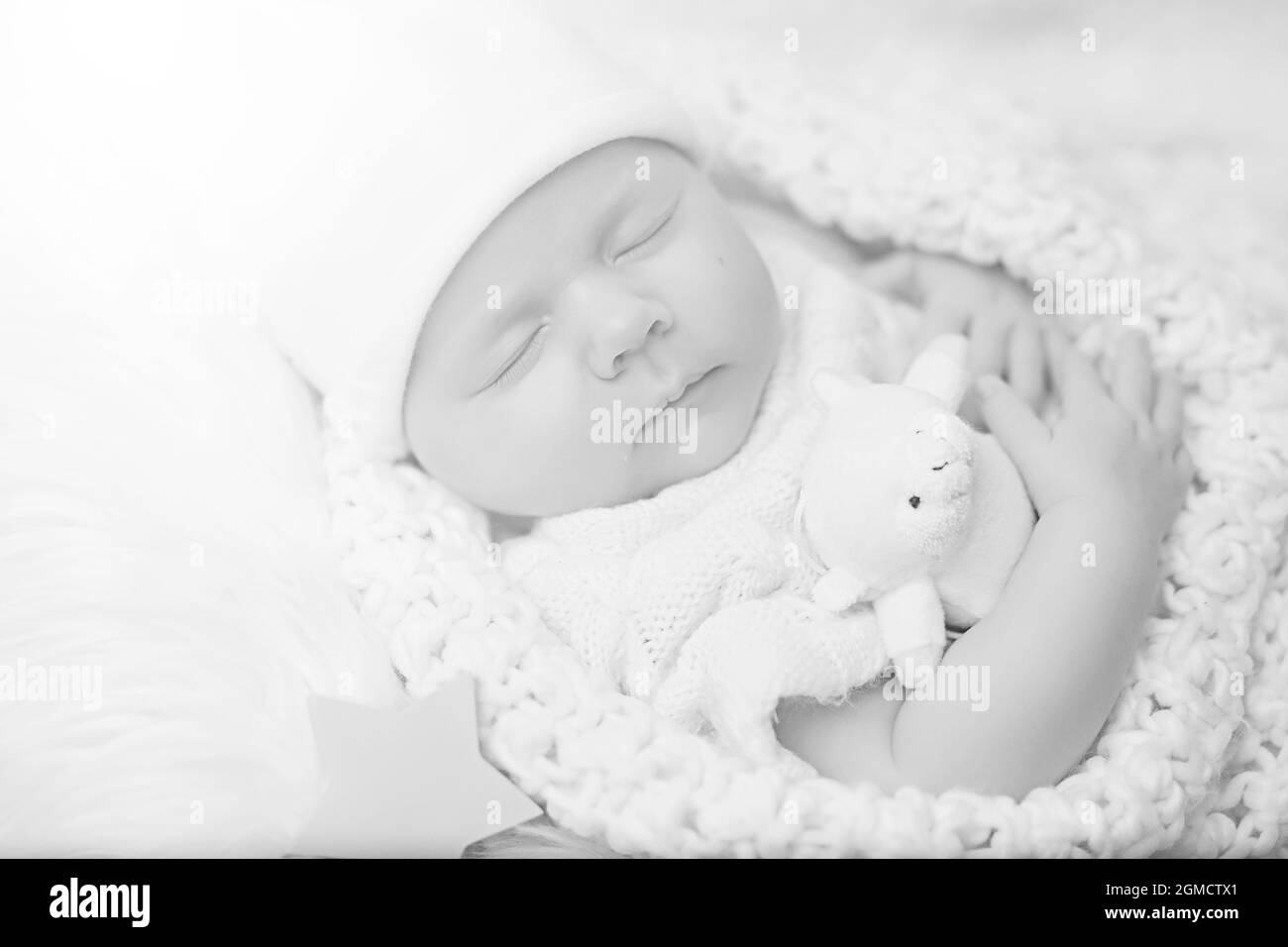 Newborn baby girl sleeping on a soft pillow Stock Photo Alamy