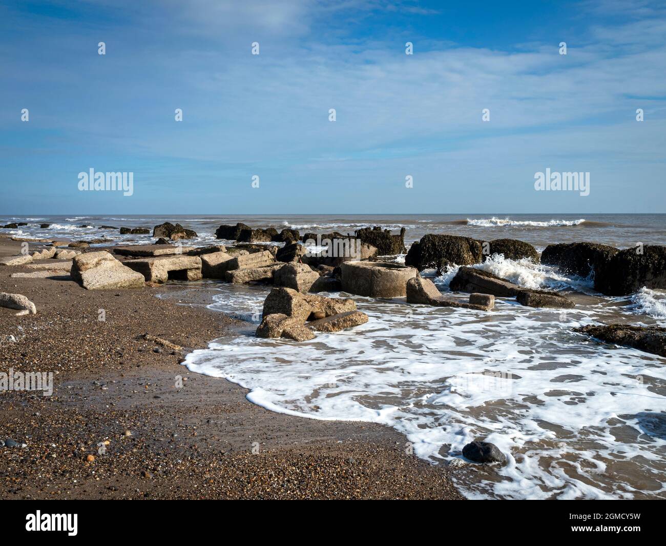 Concrete blocks on the foreshore at Spurn Point, East Yorkshire, England Stock Photo