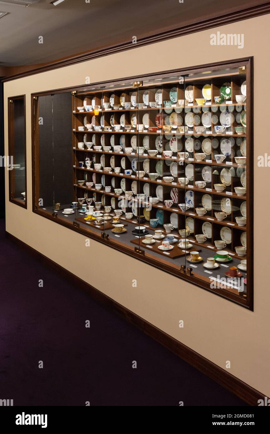 European style pottery art, cups and saucers in a wall cabinet at the Noritake Museum in Nagoya, Japan. Stock Photo
