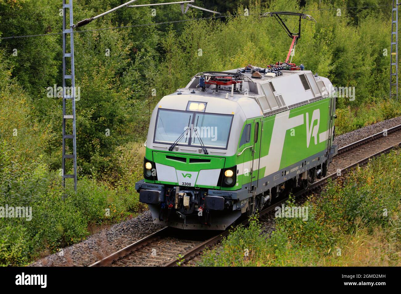 Siemens Vectron, VR Class Sr 3, is the newest electric locomotive used by Finnish VR Group.  No. 3308 at speed in Salo, Finland. September 11, 2021. Stock Photo