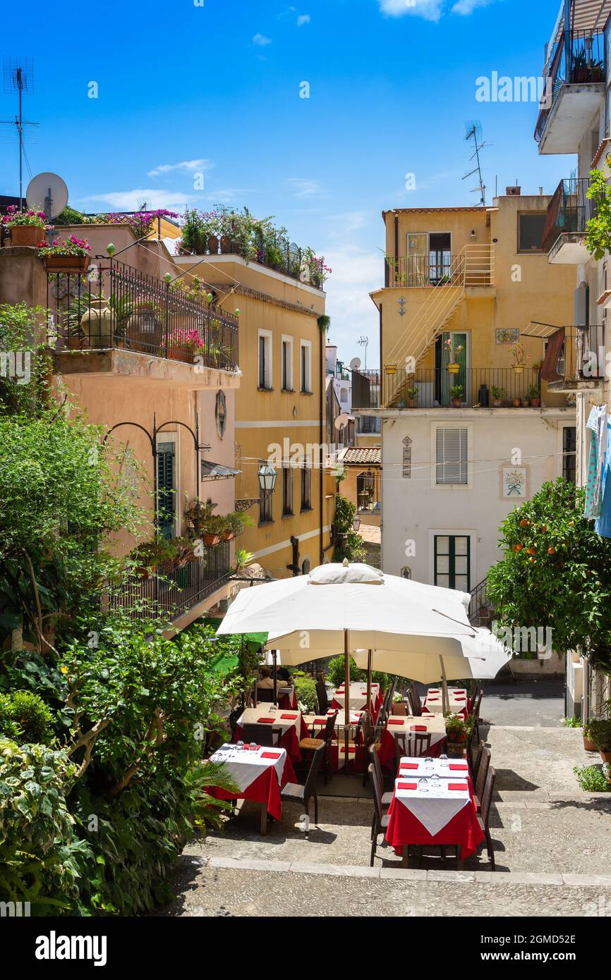 Street restaurant in the historic old town of Taormina Stock Photo