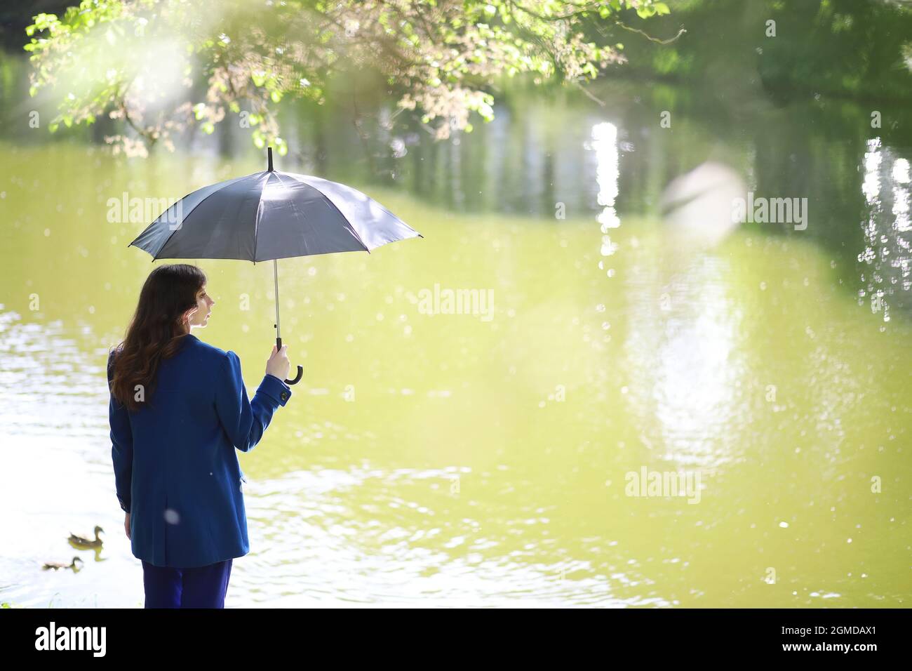 Pregnant woman on a walk in the park Stock Photo - Alamy