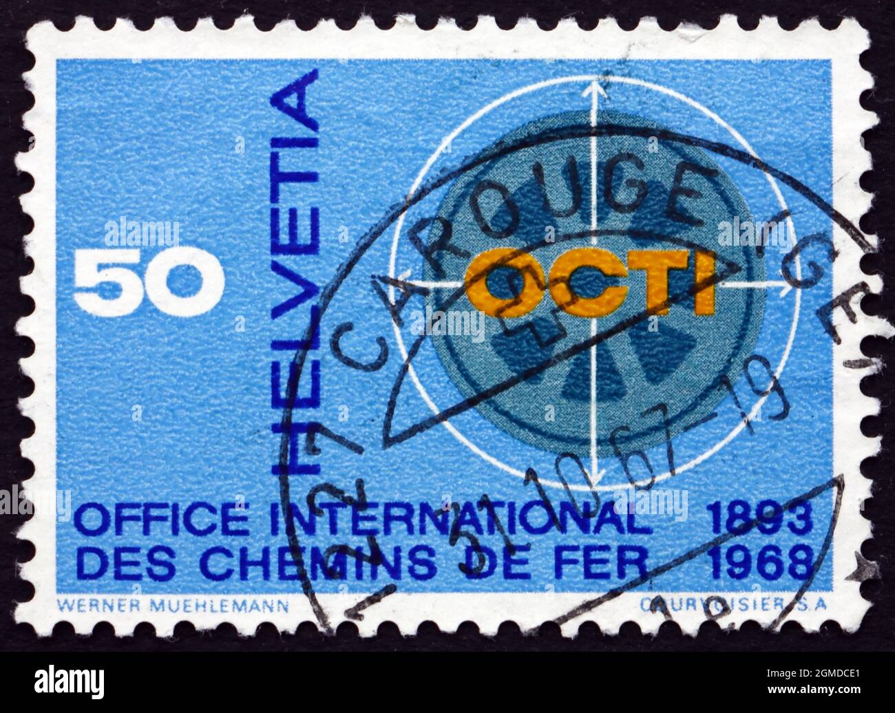 SWITZERLAND - CIRCA 1967: a stamp printed in the Switzerland shows Railroad Wheel, 75th Anniversary of the Central Office for International Railroad T Stock Photo