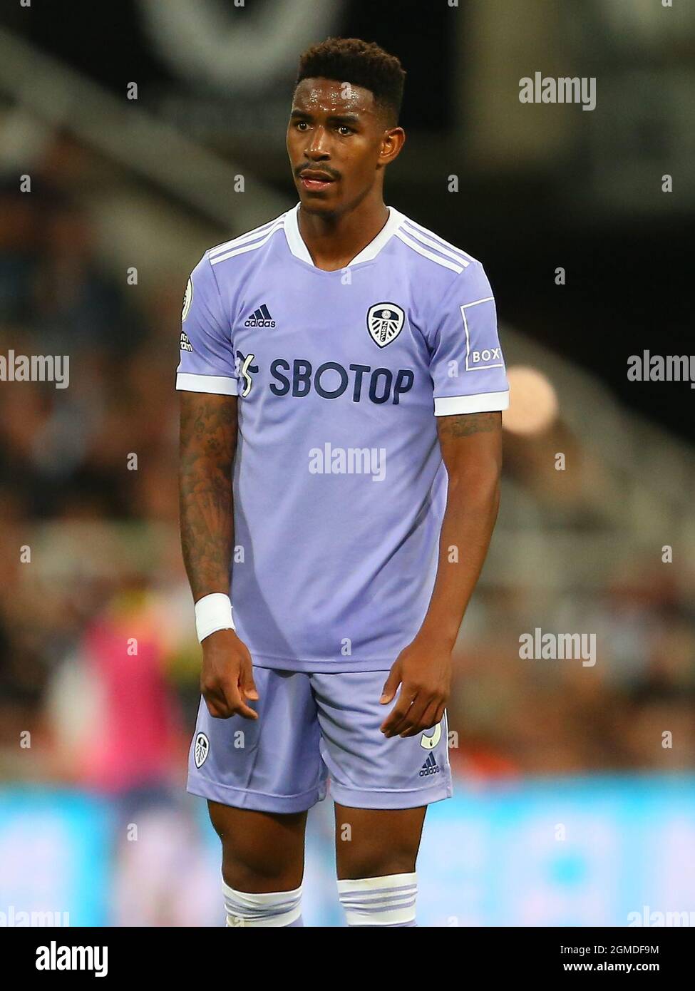 NEWCASTLE UPON TYNE, ENGLAND - SEPTEMBER 17: Junior Firpo of Leeds United during the Premier League match between Newcastle United and Leeds United at St. James Park on September 17, 2021 in Newcastle upon Tyne, England. (Photo by MB Media) Stock Photo