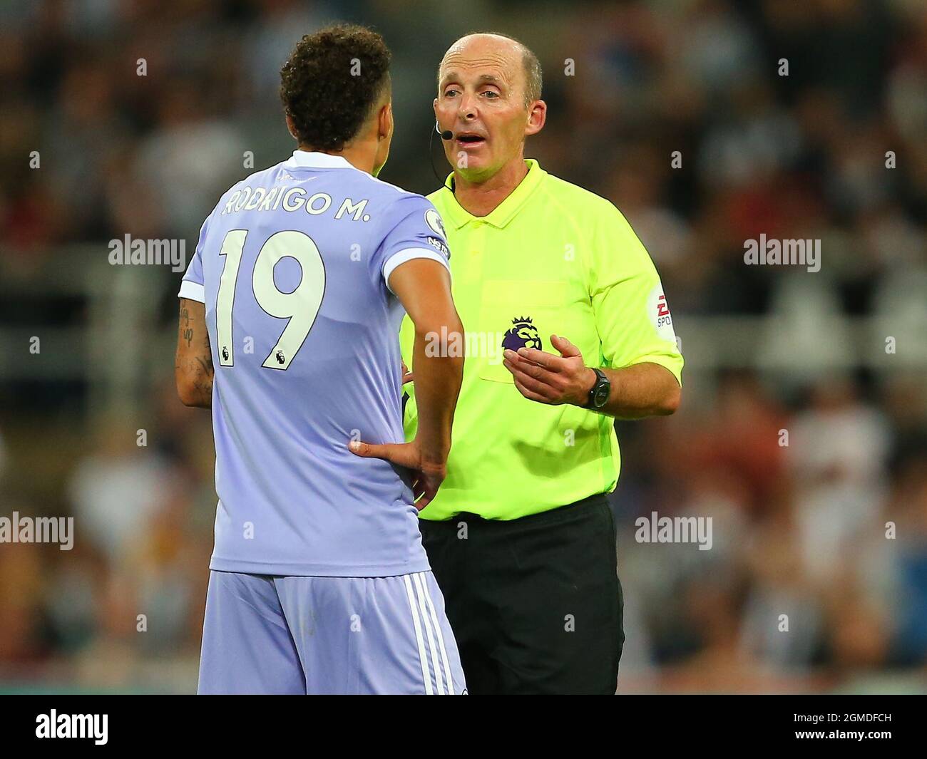 NEWCASTLE UPON TYNE, ENGLAND SEPTEMBER 17 Rodrigo of Leeds United receives a yellow card from