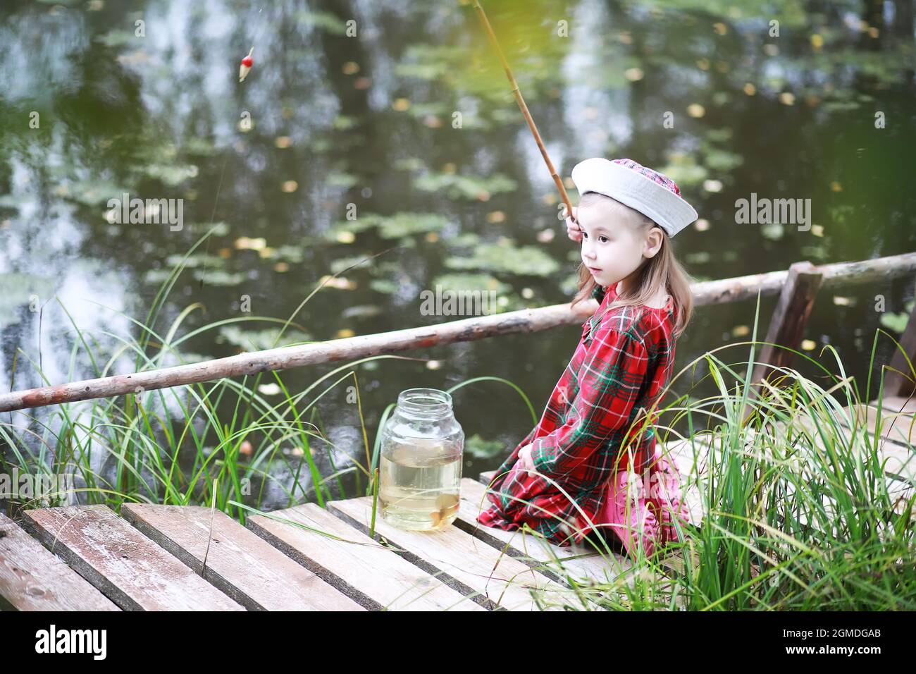 Child children boy girl fish fishing hi-res stock photography and