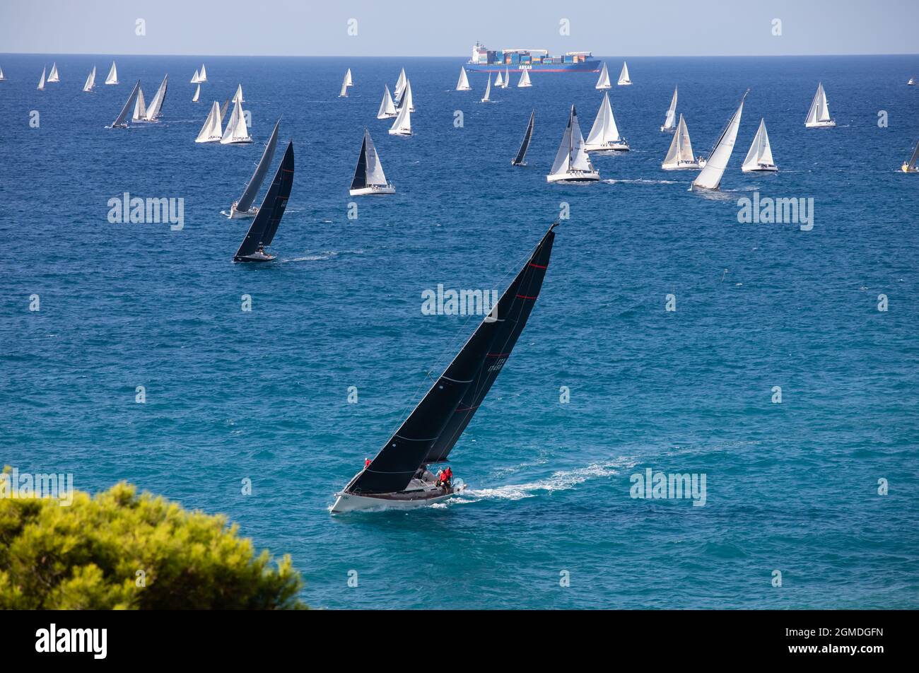 Sailing boats off the coast of Genoa after the departure of Millevele 2021 regatta Stock Photo