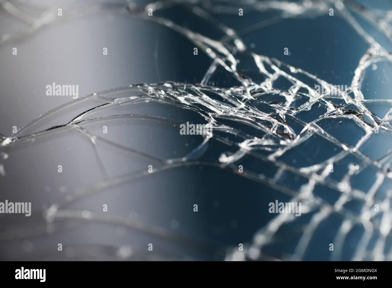 Crack on the glass. Broken screen. Broken phone. Cracked glass background.  White cracks in glass Stock Photo - Alamy