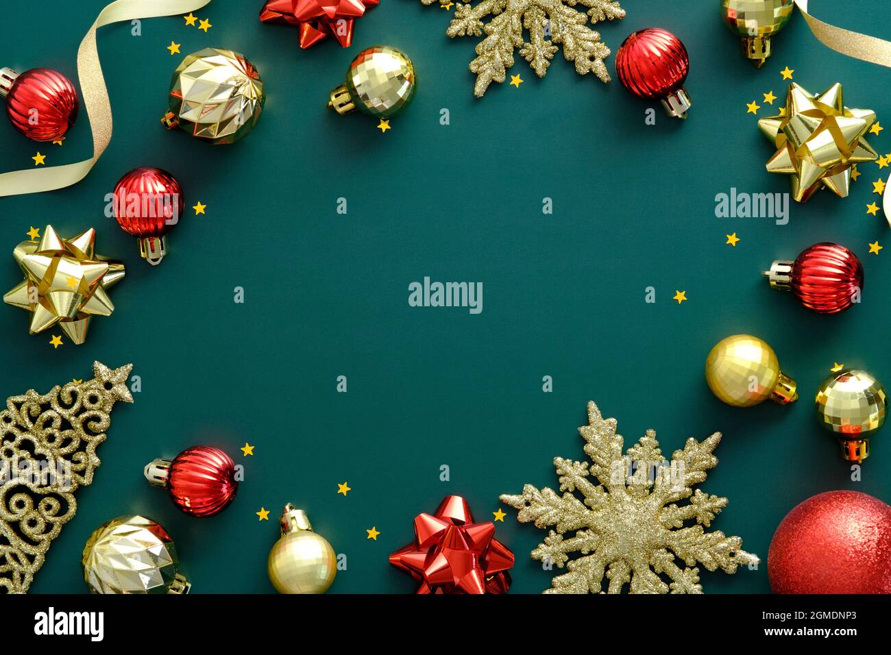 Elegant Christmas frame made of golden and red decorations on green  background. Flat lay, top view, copy space. Xmas banner design, Happy New  Year gre Stock Photo - Alamy
